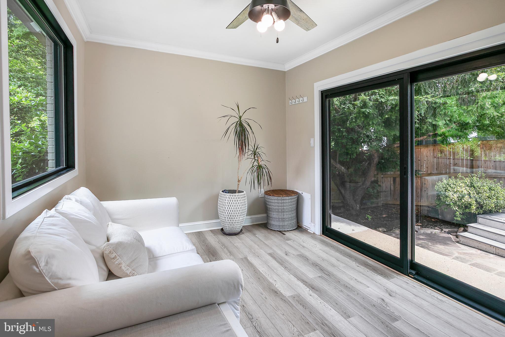 5 Spring Hill Court Chevy Chase, MD 20815 - Photo 12 of 50 a living room with furniture and a large window