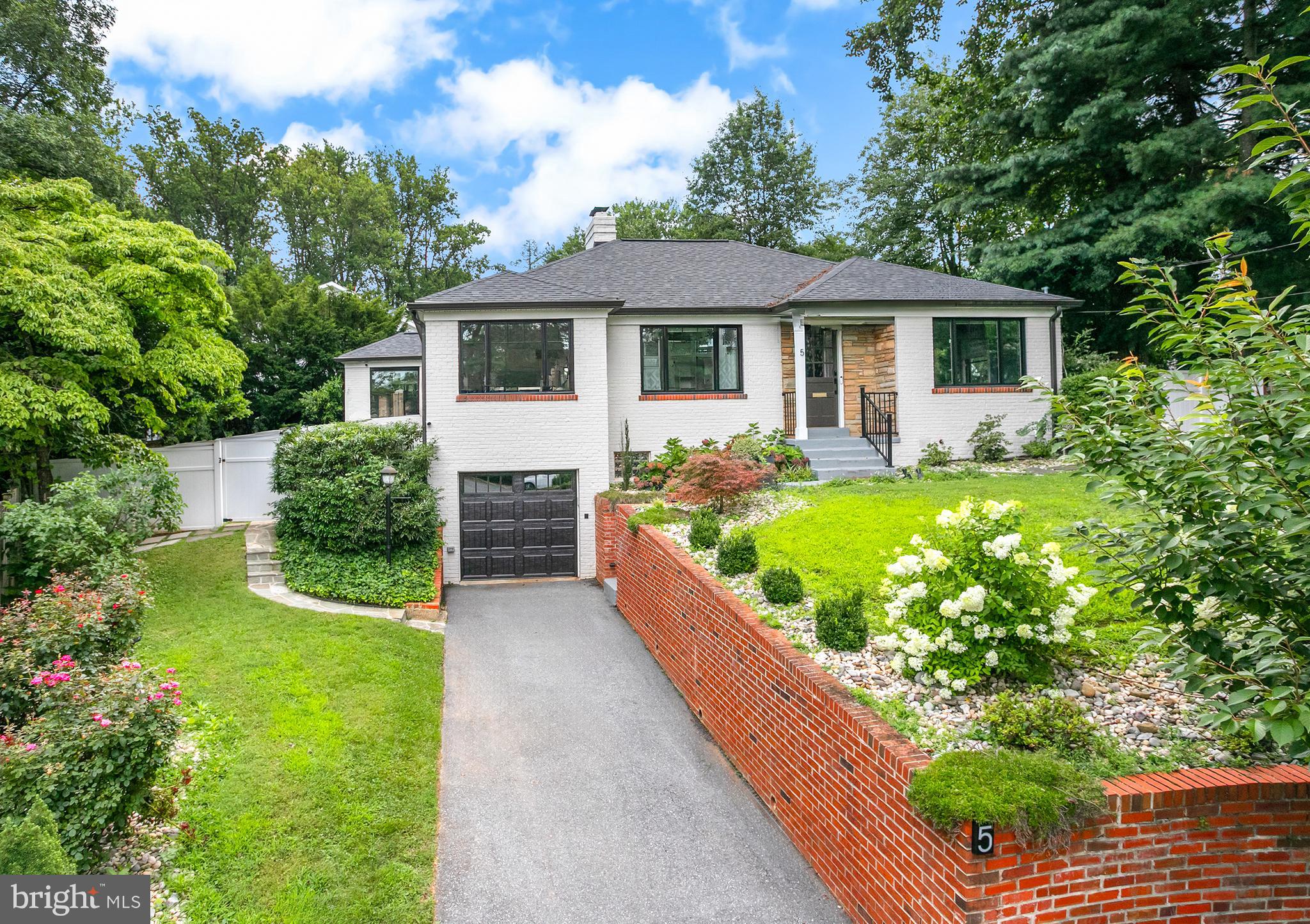 5 Spring Hill Court Chevy Chase, MD 20815 - Photo 3 of 50 a front view of house with yard and green space