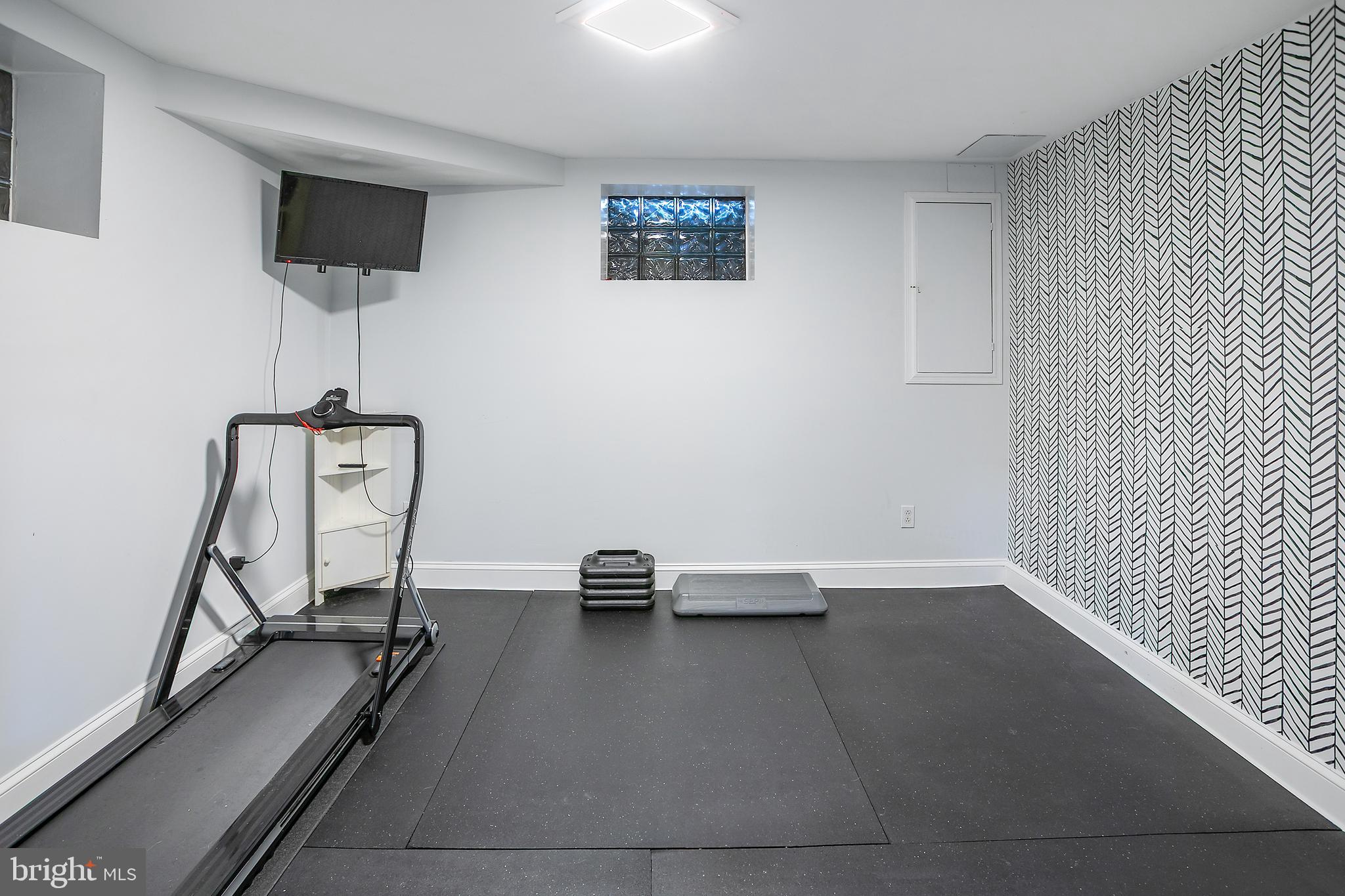 5 Spring Hill Court Chevy Chase, MD 20815 - Photo 33 of 50 a view of a room with gym equipment