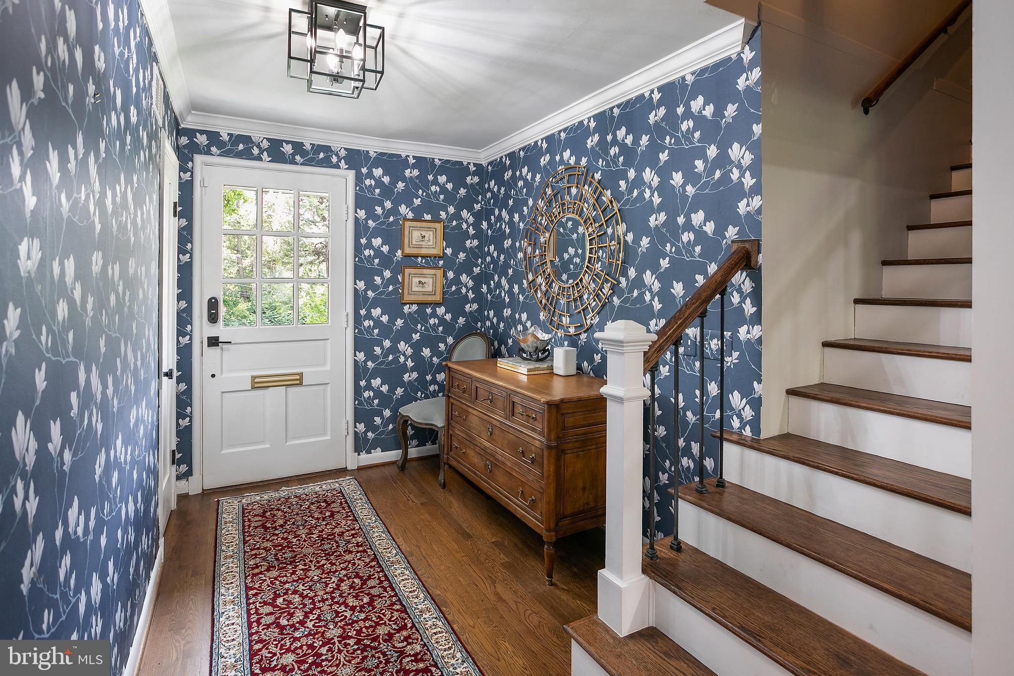 5 Spring Hill Court Chevy Chase, MD 20815 - Photo 5 of 50 a view of entryway with stairs and wooden floor