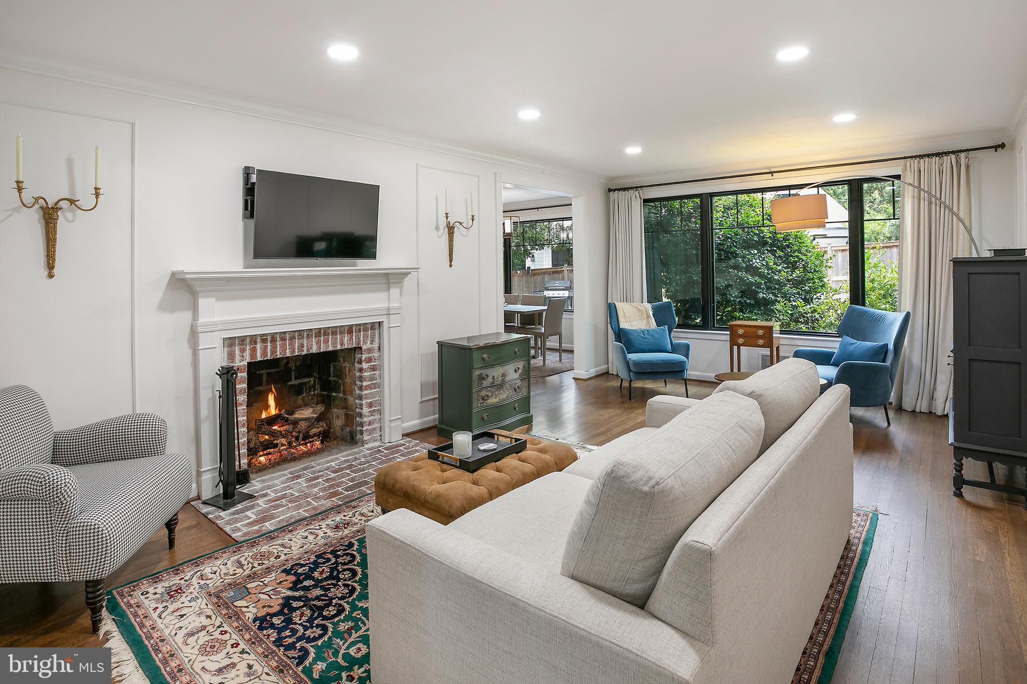 5 Spring Hill Court Chevy Chase, MD 20815 - Photo 7 of 50 a living room with furniture fireplace and flat screen tv