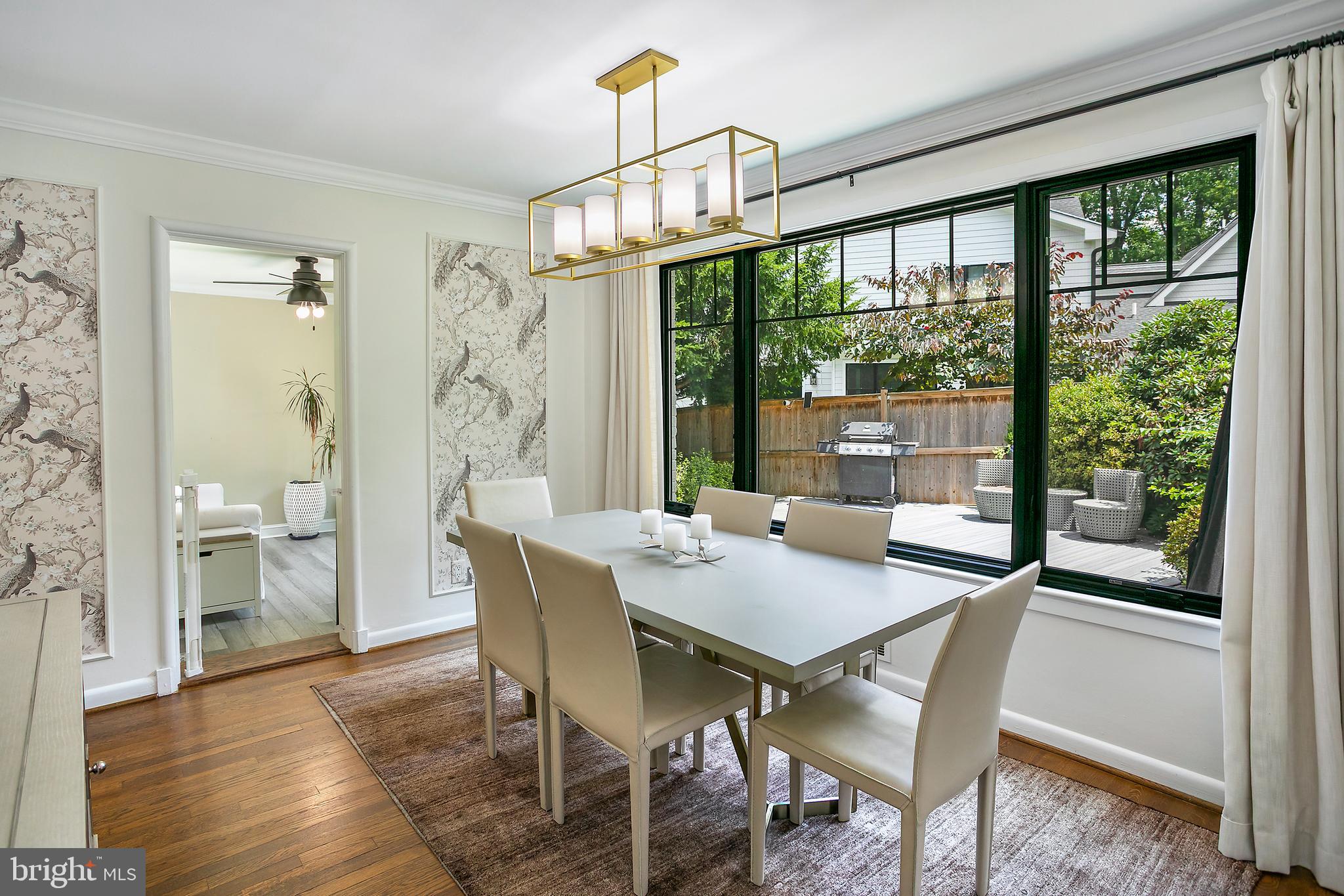 5 Spring Hill Court Chevy Chase, MD 20815 - Photo 9 of 50 a view of a dining room with furniture window and wooden floor