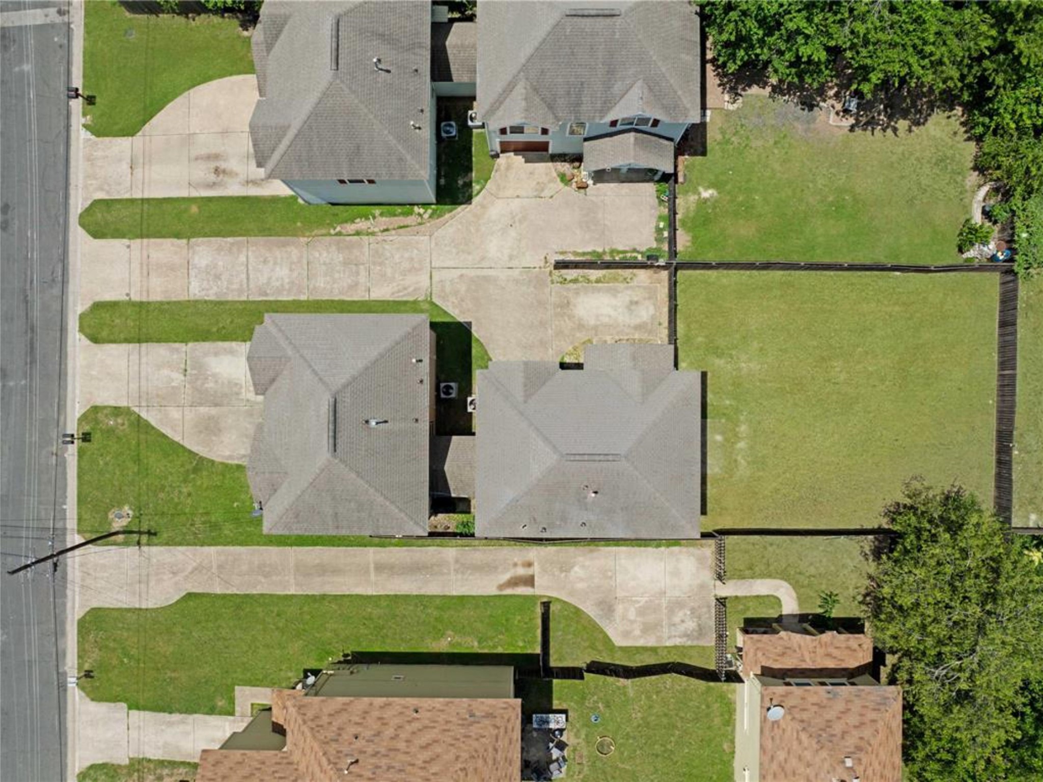 6916 Meador Avenue Austin, TX 78752 - Photo 26 of 29 an aerial view of a house with a yard