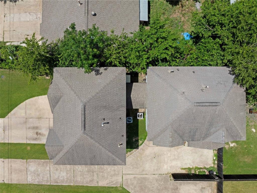 6916 Meador Avenue Austin, TX 78752 - Photo 28 of 29 an aerial view of a house with a yard and large tree