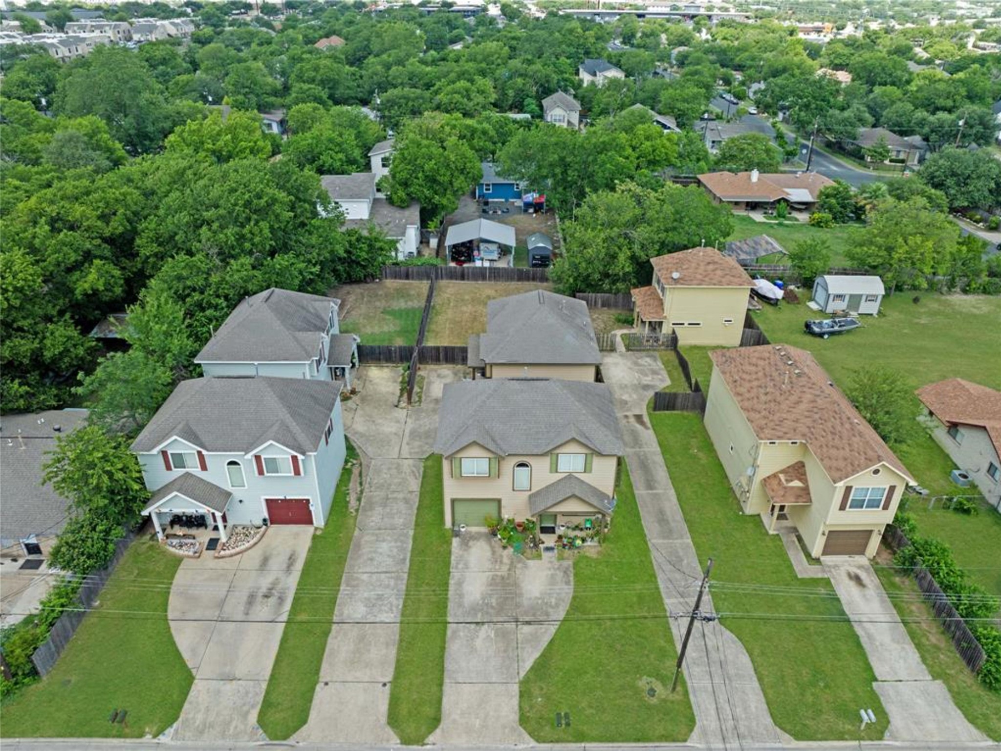 6916 Meador Avenue Austin, TX 78752 - Photo 8 of 29 an aerial view of a house with a swimming pool