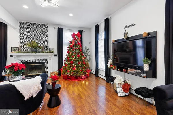 a room with furniture and wooden floor