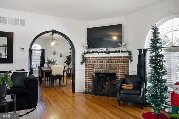 a room with table chairs and entryway