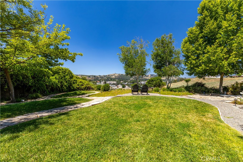 669 Red Cloud Road Paso Robles, CA 93446 - Photo 37 of 61 a view of yard with swimming pool and green space