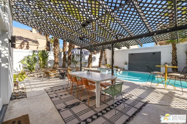 a view of yard with patio