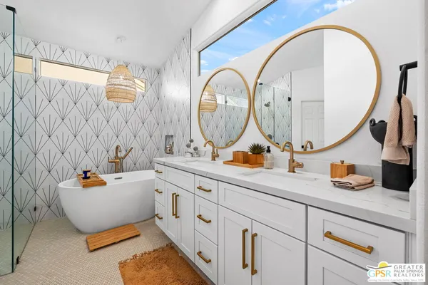 a bathroom with a bathtub and shower