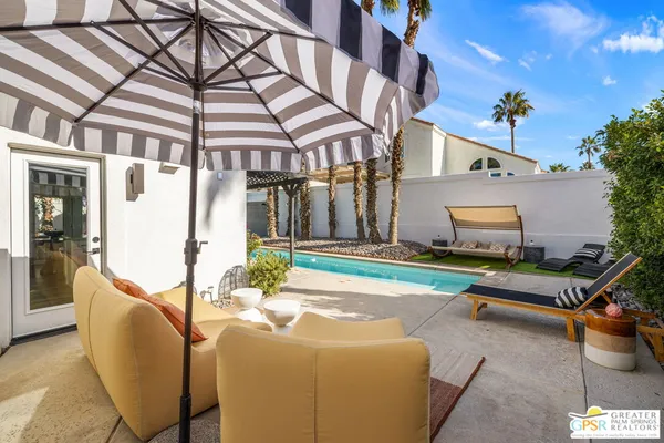 a house view with a outdoor space
