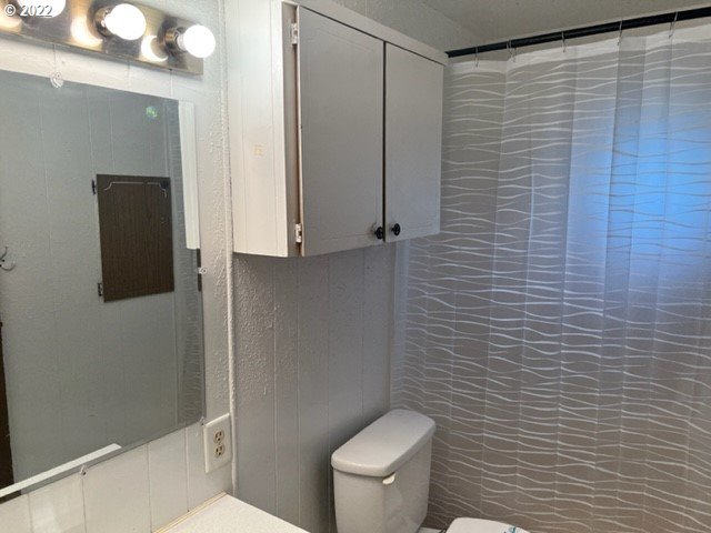 88148 5th Street Veneta, OR 97487 - Photo 12 of 20 a bathroom with a toilet and a shower