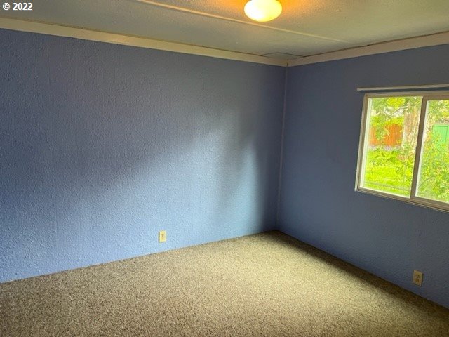 88148 5th Street Veneta, OR 97487 - Photo 14 of 20 a view of an empty room with a window