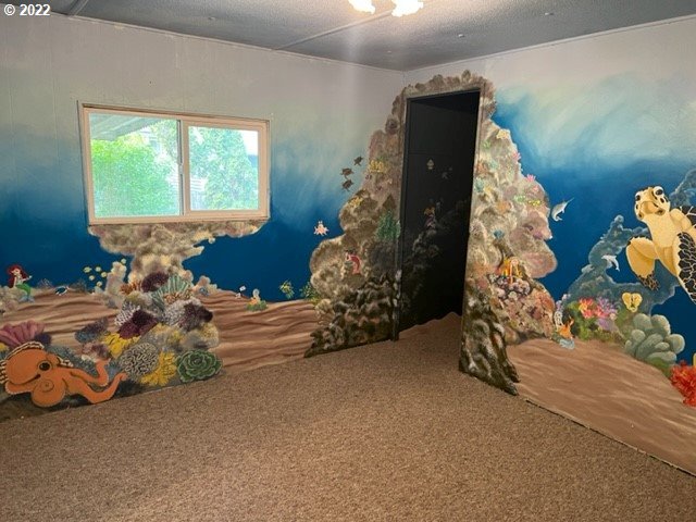 88148 5th Street Veneta, OR 97487 - Photo 18 of 20 a bed room with a bed and a window