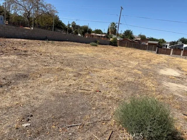 a view of ocean with a yard