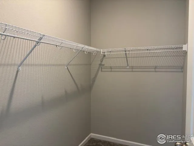 a view of a room with racks on the wall