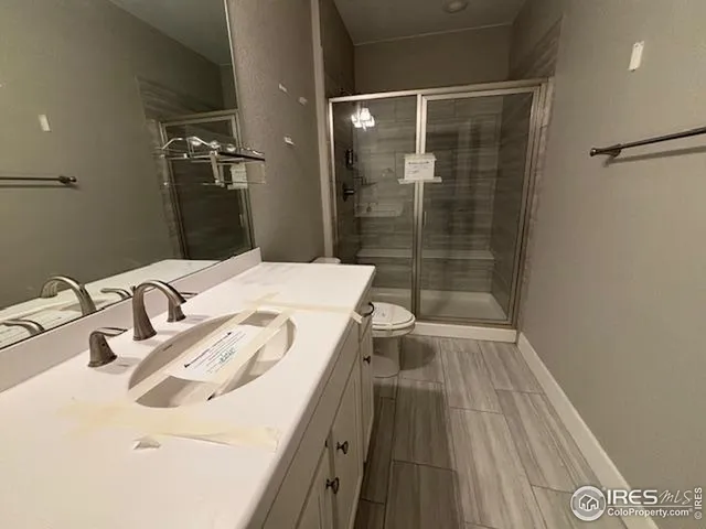 a bathroom with a sink and a shower