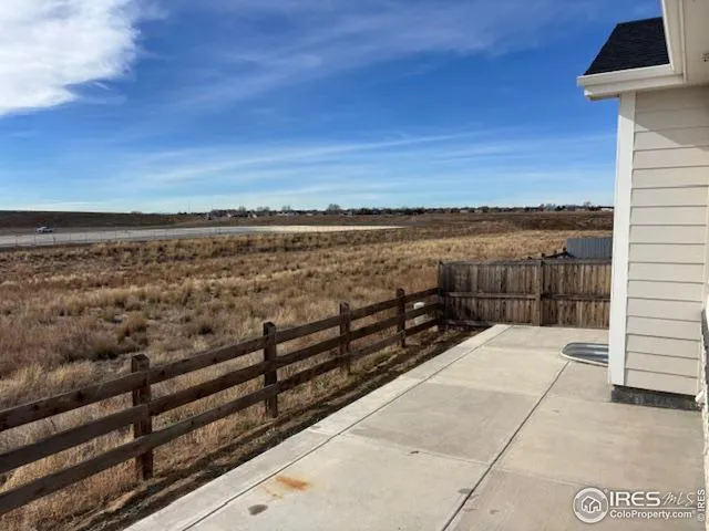 a view of a terrace with a lake