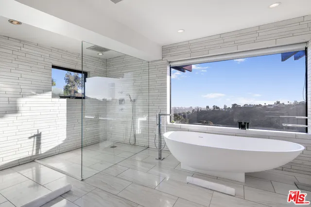 a view of a bathtub in a bathroom