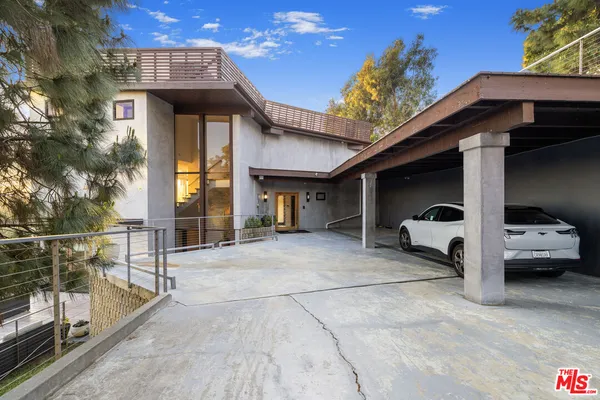 a view of a car park in front of building