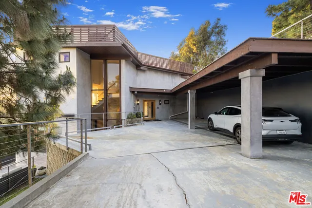 a view of a car park in front of building