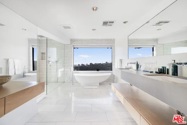 a large white room with a large window