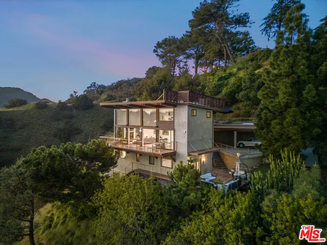 a view of a house with a garden