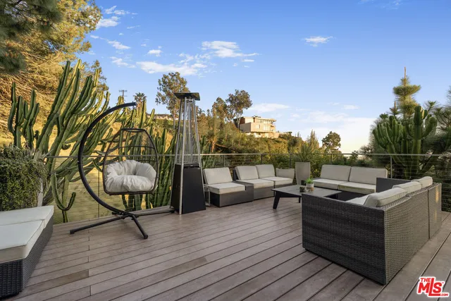 a view of a roof deck with couches