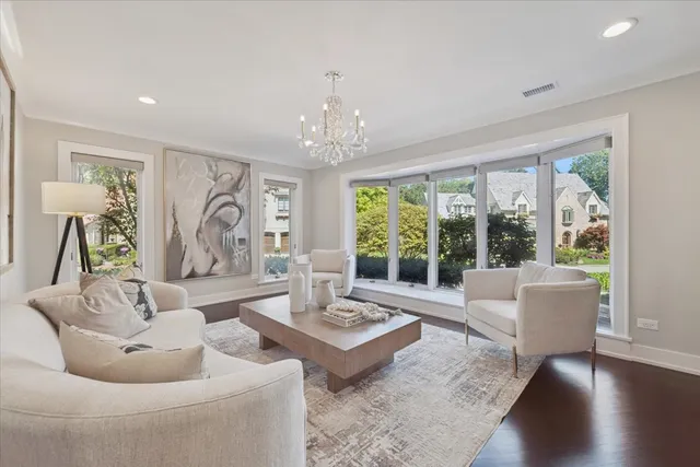 a kitchen with stainless steel appliances granite countertop a refrigerator and a stove