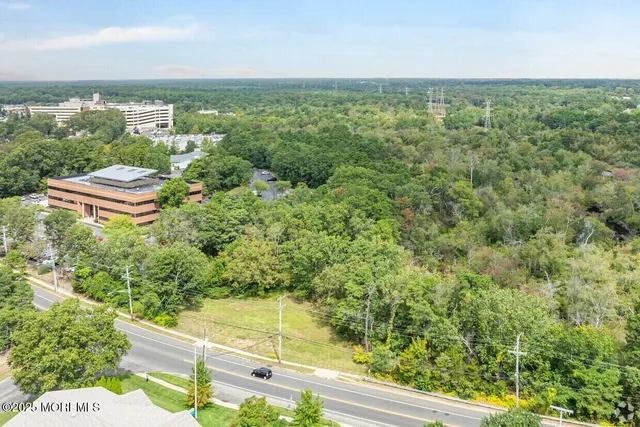 an aerial view of a city with lots of residential buildings