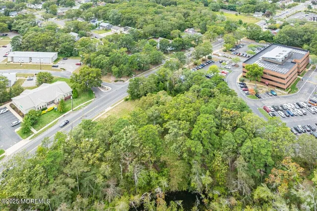an aerial view of a city with lots of residential buildings