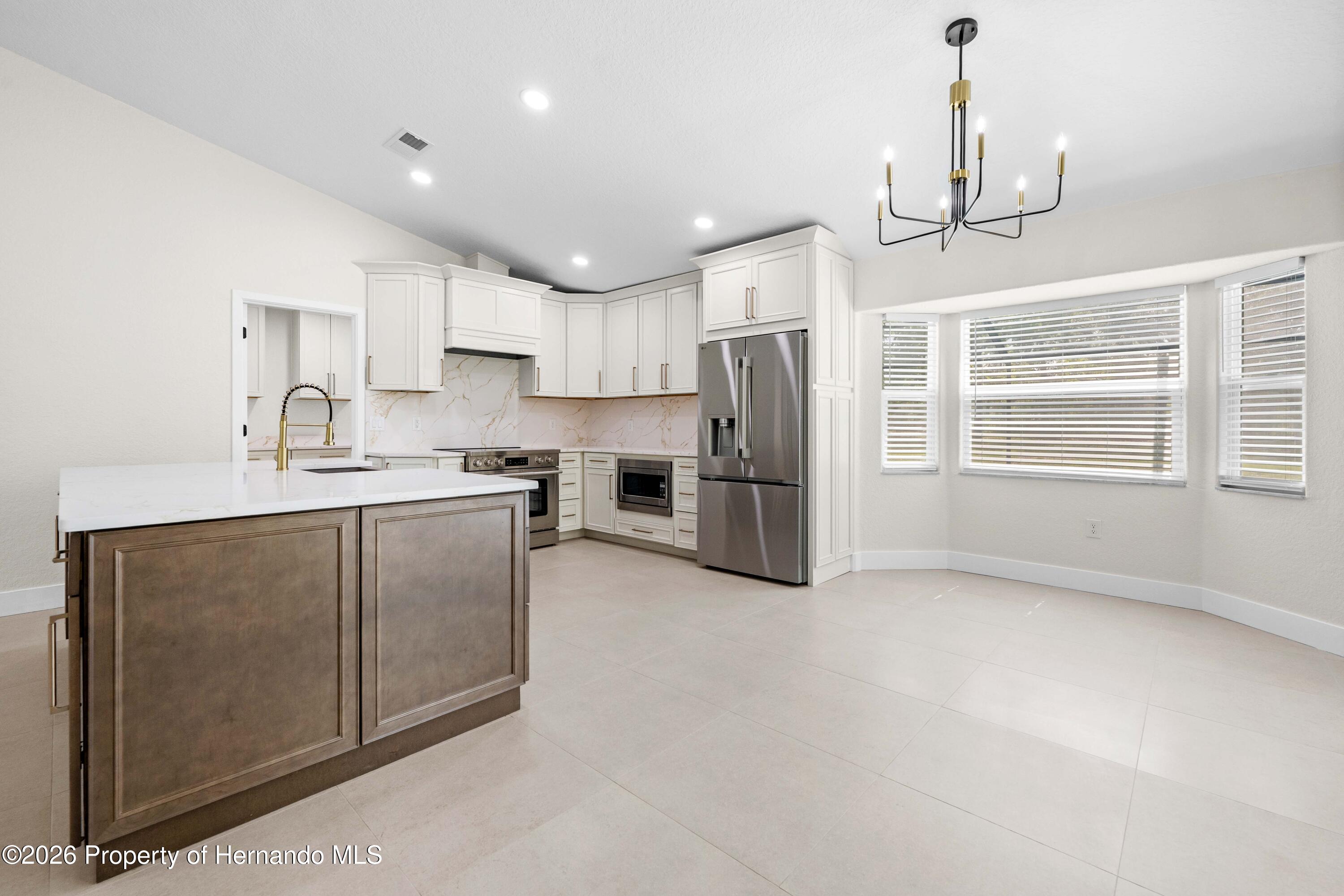 9086 Grove Road Spring Hill, FL 34613 - Photo 6 of 32
