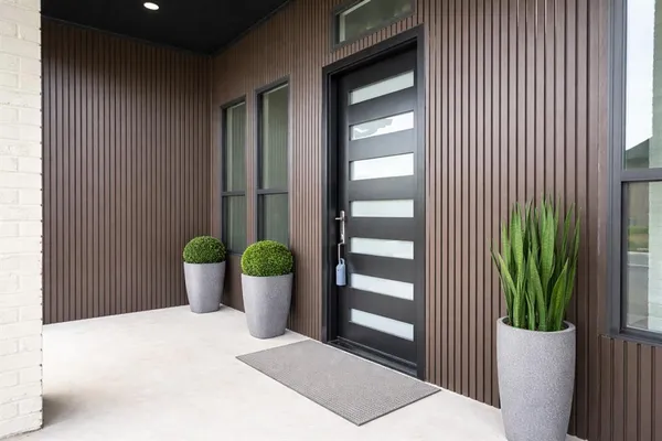 a kitchen with kitchen island granite countertop a sink and stove
