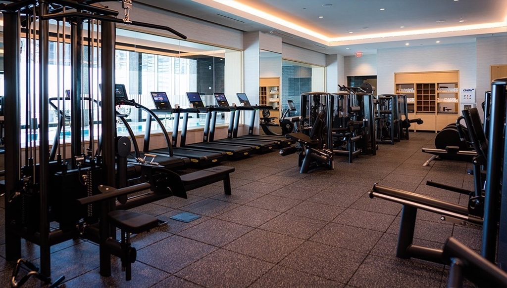 240 Devonshire Street, Unit 5514 Boston, MA 02110 - Photo 19 of 26 a view of a room with gym equipment