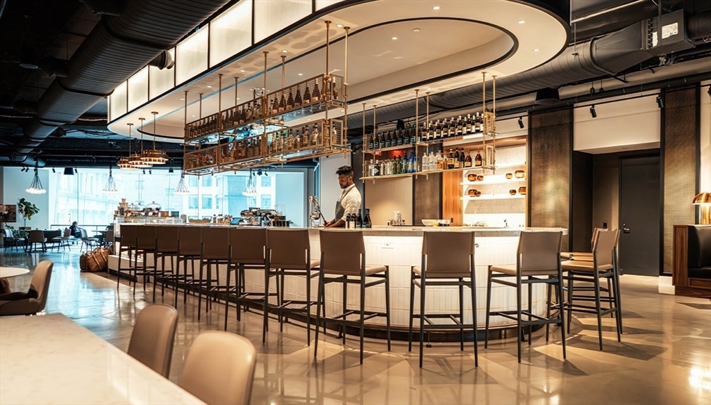 240 Devonshire Street, Unit 5514 Boston, MA 02110 - Photo 22 of 26 a view of a chairs and table in a patio