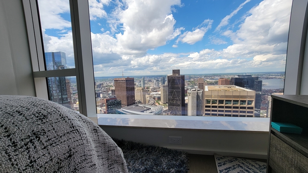 240 Devonshire Street, Unit 5514 Boston, MA 02110 - Photo 9 of 26 a view of a balcony with city view