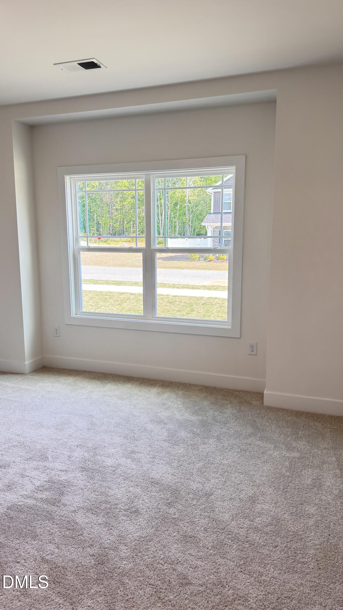 20 Streamline Court Lillington, NC 27546 - Photo 8 of 46 an empty room with a window