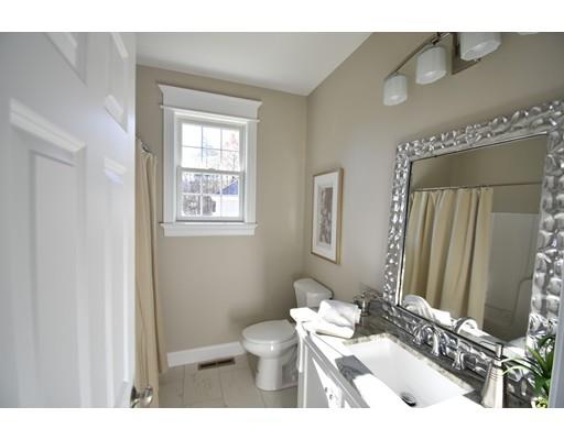 50 Ridge View Road Northampton, MA 01062 - Photo 18 of 28 a bathroom with a granite countertop sink mirror vanity and a toilet