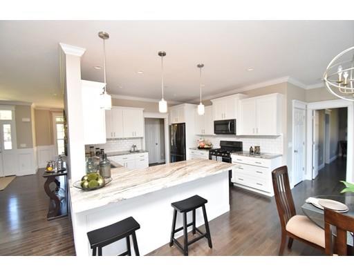50 Ridge View Road Northampton, MA 01062 - Photo 5 of 28 a living room with stainless steel appliances kitchen island granite countertop furniture and a view of kitchen