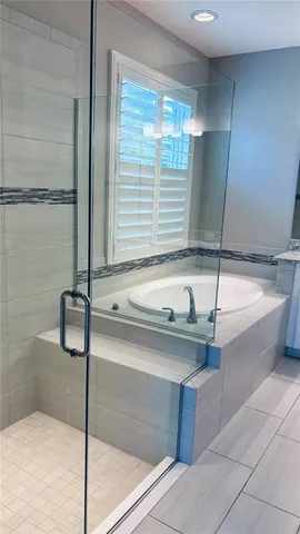 a bathroom with a sink and a bathtub