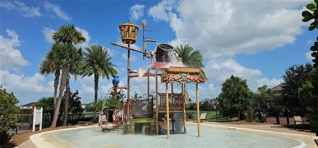 a view of a street with sitting area