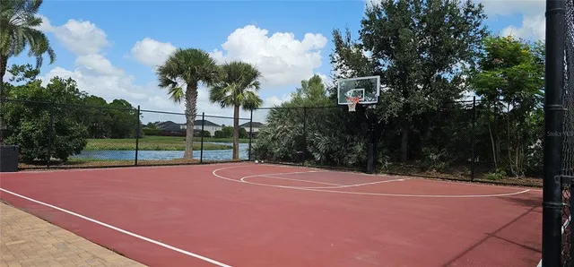 a view of outdoor space and tennis court