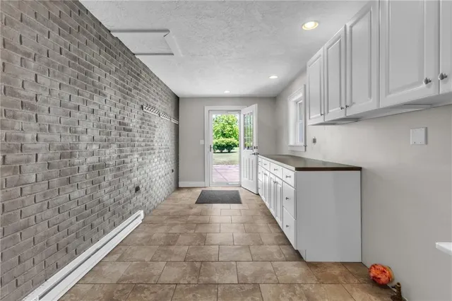 a hallway with cabinets