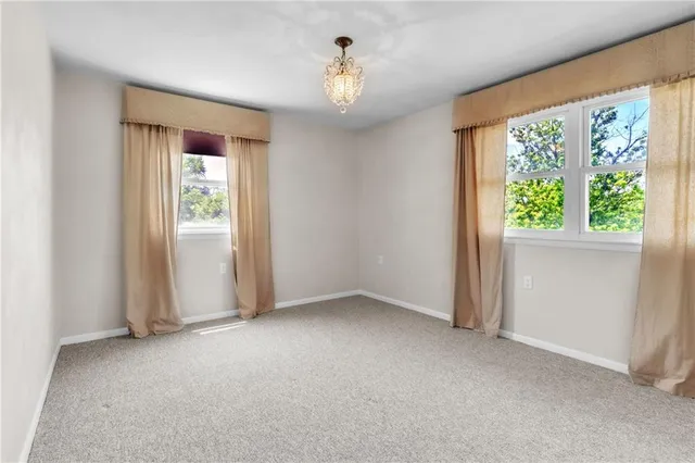 an empty room that has a window