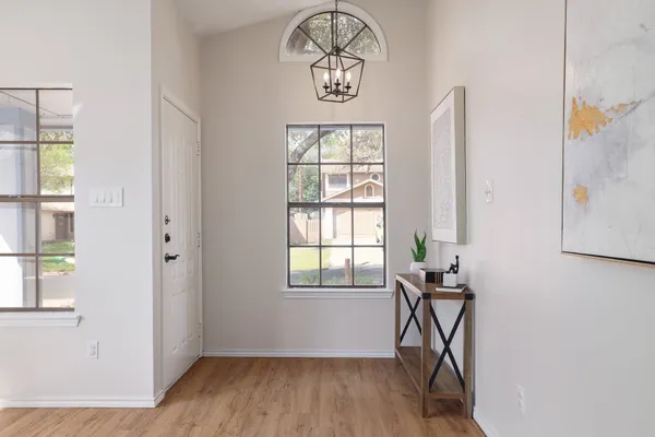a view of entryway with wooden floor