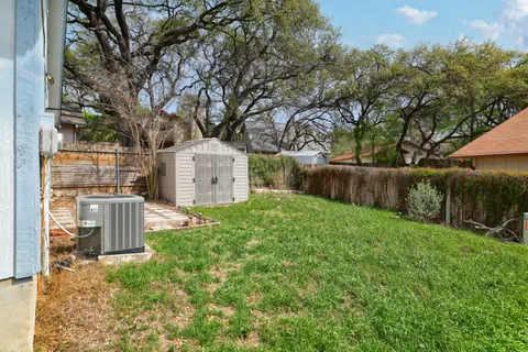 a fire hydrant in the middle of a yard