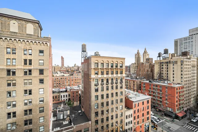 a view of a city with tall buildings