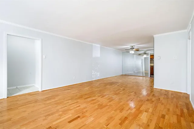 a kitchen with stainless steel appliances granite countertop a refrigerator and a stove