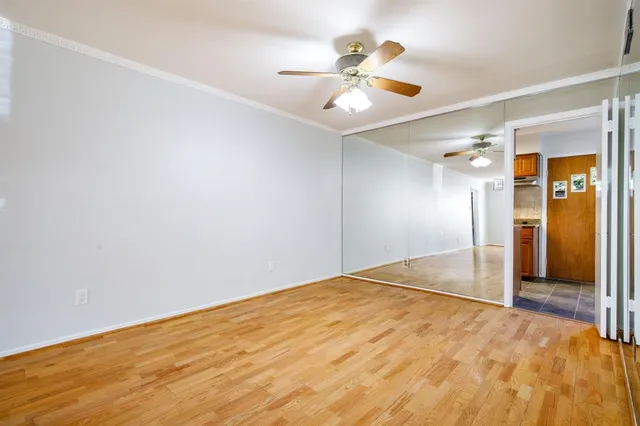 a view of an empty room with a window