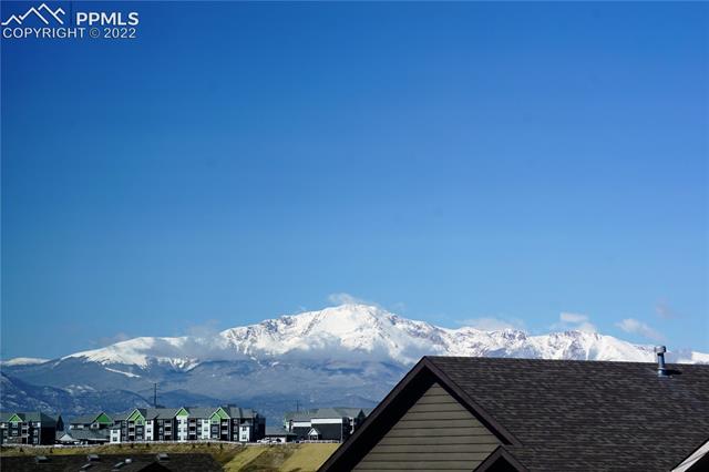 7926 Morning Dew Road Colorado Springs, CO 80908 - Photo 2 of 6 Pikes Peak and Rocky Mountain Views from upper-level bedroom.